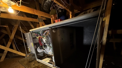 Access panel removed during wiring and setup. Photo