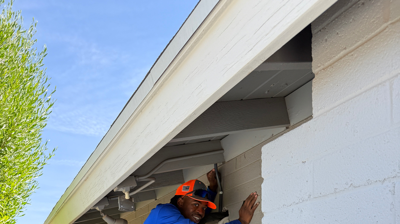 Team member, Jay, working on a mini-split installation Photo